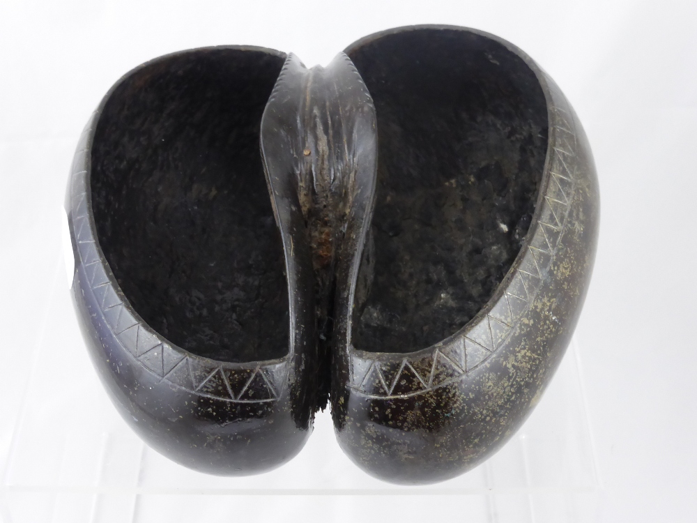 A 19th Century Coco De Mer Nut, (Lodoicea Maldivica) worked as a basket, the nut carved out to leave - Image 2 of 2