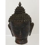 A 17th century Bronze Sino-Tibetan Head Bust depicting Buddha with an elaborate headdress, est