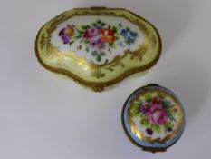 Two Antique Hand Painted Limoges Boxes, the first a circular blue pill box hand painted with pink