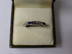 A Lady's Platinum Sapphire and Diamond Full Eternity Ring, Size O, 18 x 1 ct 8 cut dias, 18 x 2 mm