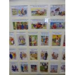 A framed collection of Donald McGill comic postcards. Approx 80 x 85 cms. (24 items)