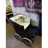 A 1920's " Westminster " baby carriage, this pram has been re-nickled.