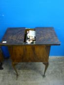 A small Edwardian sewing table with contents. (possibly fruitwood) on cabriole legs .Approx 48cm x