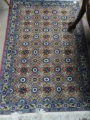 A Vintage Woollen Persian Hall Rug. The rug having pink and blue background with floral design 105 x