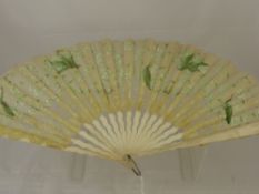 An Antique 19th Century Organza and Lace Fan, hand painted with Lilly of the Valley, on bone