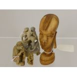 A Soapstone Study of Mischievous Monkeys,  together with a soap stone figure of a baboon and a (