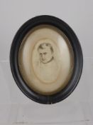 A Fine 19th Century Sepia Miniature Portrait Study of Napoleon. The portrait in a ebonized oval