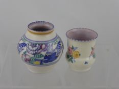 Two Poole Pottery posy vases, both having floral decoration (2)