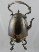 A large silver plated spirit kettle, the tripod stand with shell feet by Elkington & Co. together