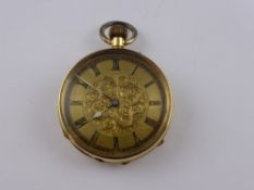 A Ladies 18 ct yellow gold Continental open space pocket watch. The pocket watch case stamped 18 k