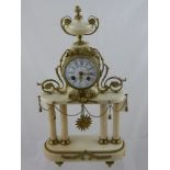 A 19th century French Japy Frere Cream Marble Mantel Clock and Garniture set, the clock having a