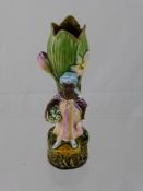 A Victorian majolica style spill vase in the form of an African lady carrying flowers, est. height