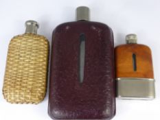 Three Vintage Gentleman's Hip Flasks, the first bound in maroon leather, the second a bamboo weave
