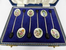 Six Silver and Enamel Coffee Spoons, the spoons having enamel bowls depicting English flowers,