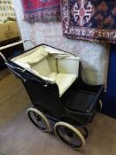 A 1920's " Westminster " baby carriage, this pram has been re-nickled.