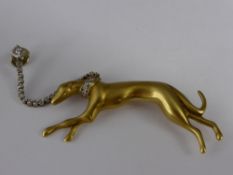 An 18 ct Yellow Gold and Diamond Greyhound Brooch, the the greyhound sporting a diamond collar