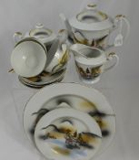 A Japanese Fine Porcelain part Tea Set. The set including five cups, six saucers, six plates,