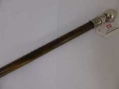 A Rhino Horn Swagger Stick, with silver top.