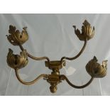 A Pair of Antique Gilt Brass Wall Sconces, with reeded supports and foliate light surround,