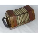 A Campbell's of Glasgow "Celestial Tone" Concertina, circa 1890, two buttons on the end drop the