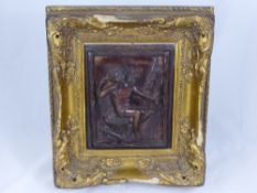 A Decorative Bronzed Plaque, depicting Cupid, the plaque inscribed Bertraux Paris 1868, approx 19