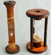 Two Antique Sand Timers, crafted from 19th Century textile mill bobbins, approx 23 and 27 cms