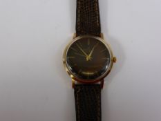 A Gentleman's Vintage Breitling Wrist Watch, round face with baton numerals, stainless steel back,