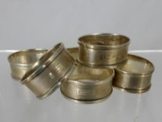 Six Oval Silver Napkin Rings, each with unmarked cartouche, Birmingham hallmark, circa 1970's,