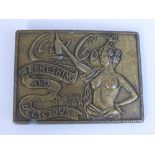 A Vintage American Metal Coca Cola Belt Buckle. The buckle depicting a naked lady with arm