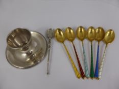 Six Danish Silver and Enamel Coffee Spoons, stamped 925 together with an egg cup stamped silver