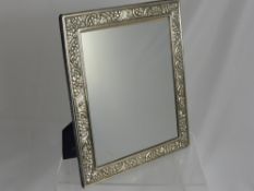 A Lady's Silver Framed Easel Dressing Table Mirror, Sheffield hallmark, dated 1990, of decorative