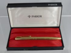 A Gold Plated Parker Fountain Pen, ribbed finish, in the original box.