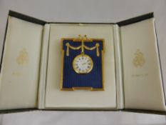 A Kilnay & Co., Blue Enamel and Metal surround Adam Style Clock dated 1992.