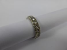 A Lady's 18 ct White Gold and Diamond Full Eternity Ring, size O, the ring set with 19 dias of 16