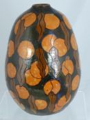 A Circa 1930's Ovoid Vase, Studio Pottery, the decorative glaze with fruit and seed pod design.