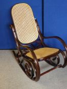 A Bentwood Style Rattan Rocking Chair.