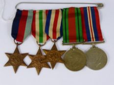 A group of five Second World War medals awarded to Pte. Edward Dixon comprising 1939 / 45 Star,