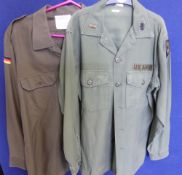 Two Military Polyester and Cotton Army Shirts, including US Army and German. (2)