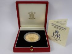 A Royal Mint United Kingdom Coronation 40th Anniversary Gold Proof Crown. With original box and