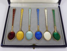 Six Danish Silver and Enamel Coffee Spoons, stamped 95 in the original box.