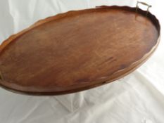 George III Mahogany Oval Tray, having a gallery with gilt and brass twin scroll handles, approx