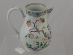 A Late 19th Century Famile Rose Water Jug, the jug depicting tree peony and birds, approx 21 cms