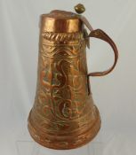 A Large Decorative Newlyn School Style Copper Jug, highly decorated with Fleur de Lys design, approx