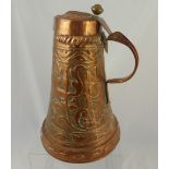 A Large Decorative Newlyn School Style Copper Jug, highly decorated with Fleur de Lys design, approx