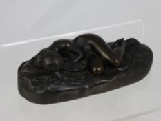 A Circa 19th Century Bronze Study of a Naked Sleeping Lady, 18 x 8.5 x 5 cms.