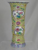 An Antique Chinese Yellow Famille Rose Vase, the rose of tall beaker form, hand painted with