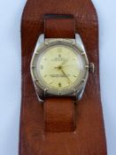 A Gentleman's Stainless Steel Vintage Part Rolex wristwatch,  The watch having a gold plated bezel