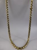 An 18 ct White and Yellow Gold and Ruby Continental Snake Link Necklet. Length of necklace 45 cms,