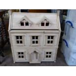 A Hand Made Dolls House, with all the components.