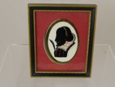 Three framed and glazed silhouettes depicting " Miss Rosamond "  and " Gentle Will Shakespeare " and